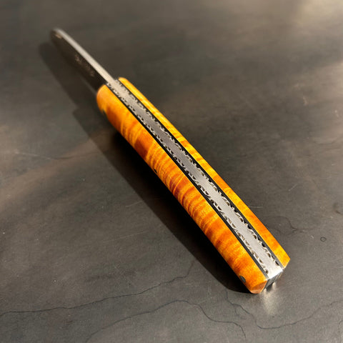 Liadou Exception in Ebony with Chiseled Plates