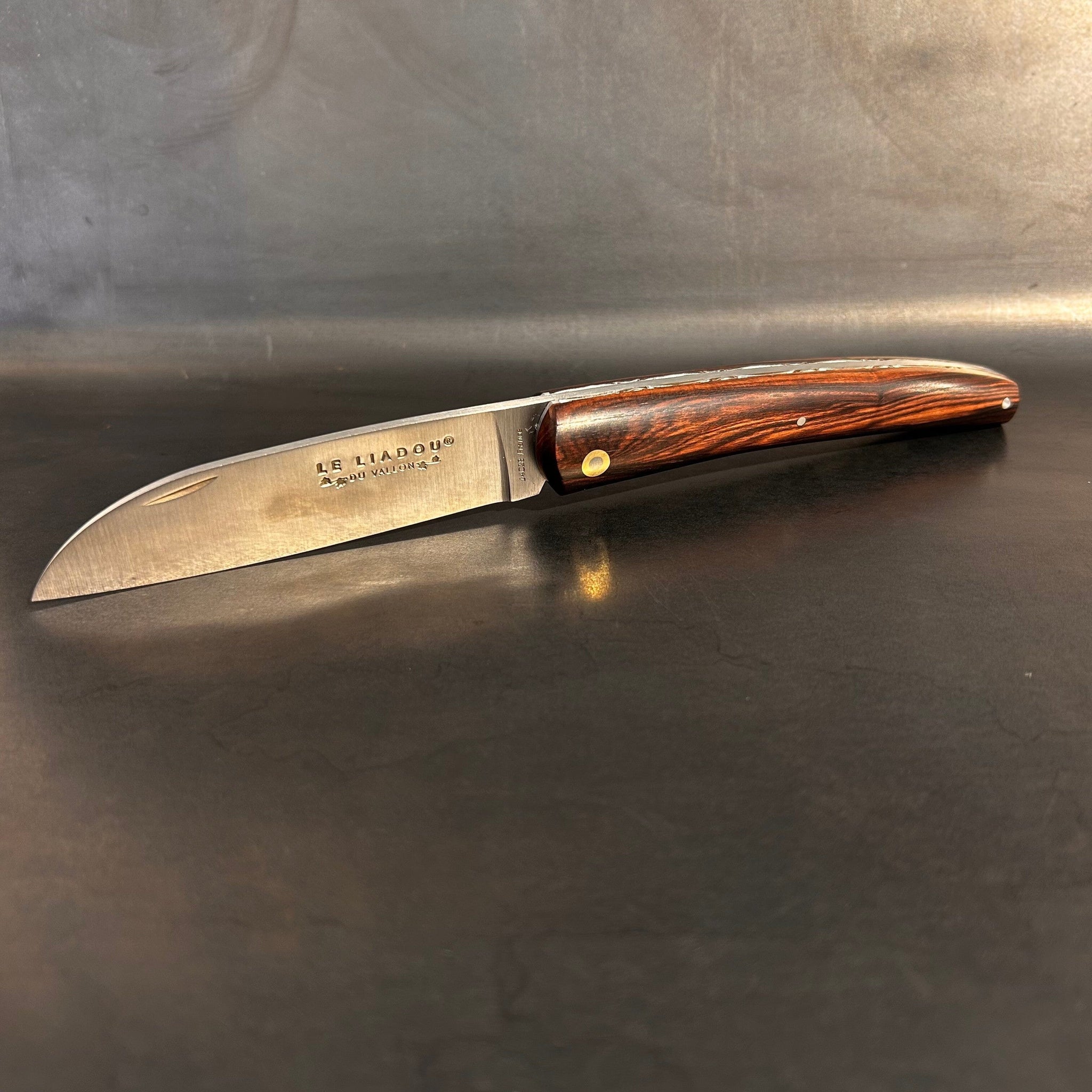 Liadou Exception in Ebony with Chiseled Plates