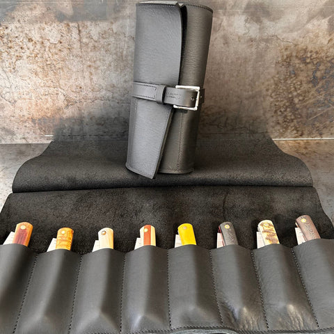 Trousse de rangement et de transport en cuir noir pour 8 couteaux.