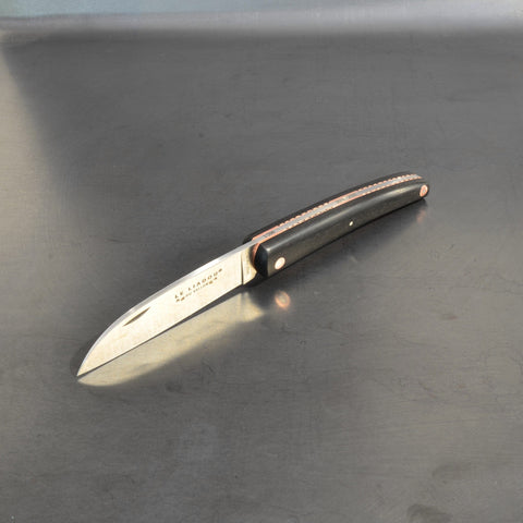 Liadou Exception in Ebony with Chiseled Plates