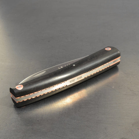 Liadou Exception in Ebony with Chiseled Plates