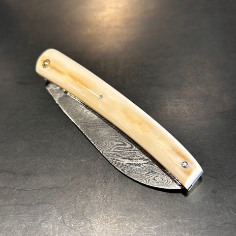 Liadou Exception in Fossilized Mammoth Ivory with chiseled plates & carbon damascus blade