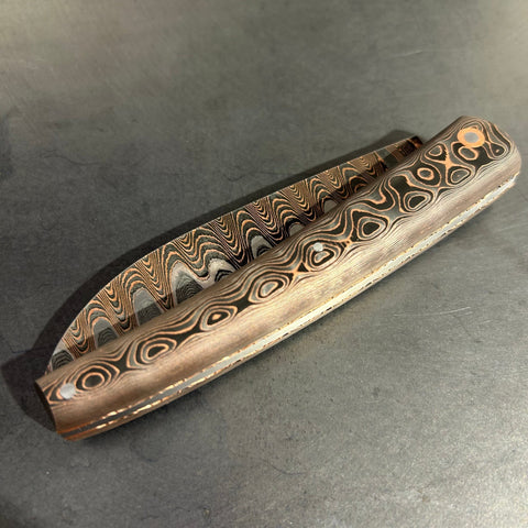 Liadou Exception in carbon fiber/copper, chiselled copper plates &amp; stainless steel Damascus blade