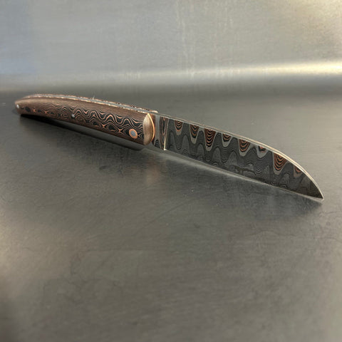 Liadou Exception in carbon fiber/copper, chiselled copper plates &amp; stainless steel Damascus blade