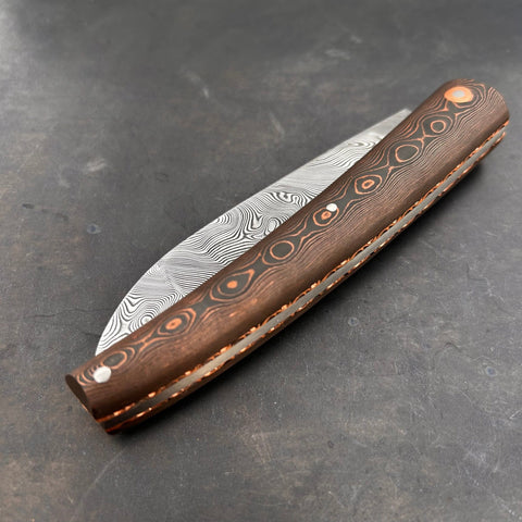 Liadou Exception in carbon fiber/copper, chiseled copper plates &amp; stainless steel Damascus blade