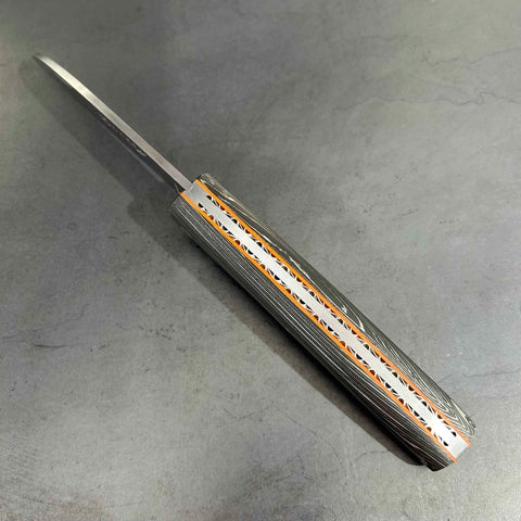 Liadou Exception in carbon fibre/brass inserts & Chiselled plates