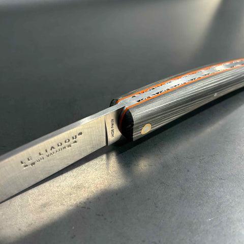 Liadou Exception in carbon fibre/brass inserts & Chiselled plates