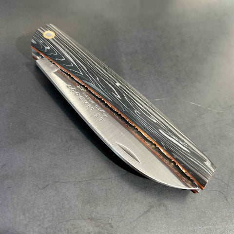 Liadou Exception in carbon fibre/brass inserts & Chiselled plates