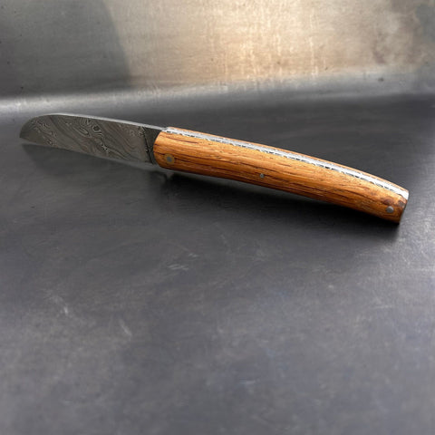 Liadou Exception in Cask Oak withe Chiselled Plates & Damascus Blade