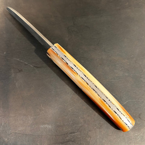 Liadou Exception in Marbled Horn Tip, Chiseled Plates & Stainless Steel Damascus Blade