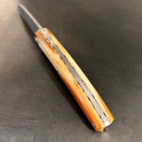 Liadou Exception in Marbled Horn Tip, Chiseled Plates & Stainless Steel Damascus Blade