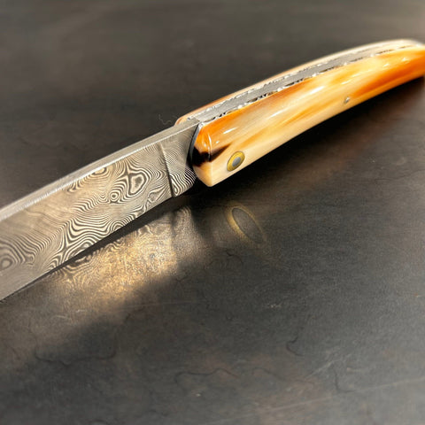 Liadou Exception in Marbled Horn Tip, Chiseled Plates & Stainless Steel Damascus Blade