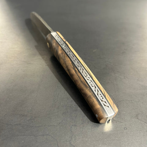 Liadou Exception in Vallon Walnut & Chiseled Plates