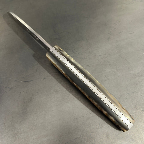 Liadou Exception in Ram's Horn & Chiseled Plates
