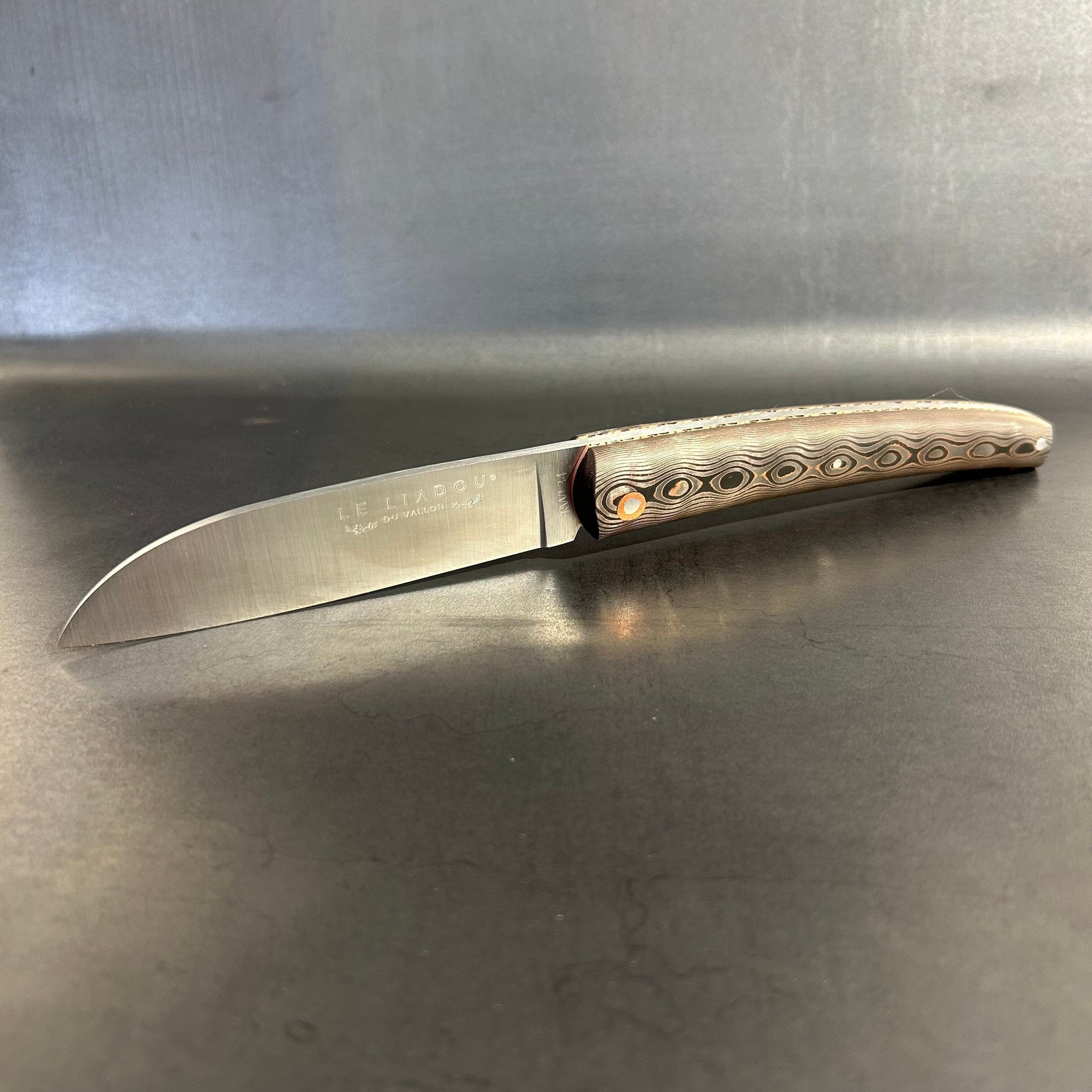 Liadou Exception in carbon fiber/copper, chiseled copper plates & RWL34 steel blade