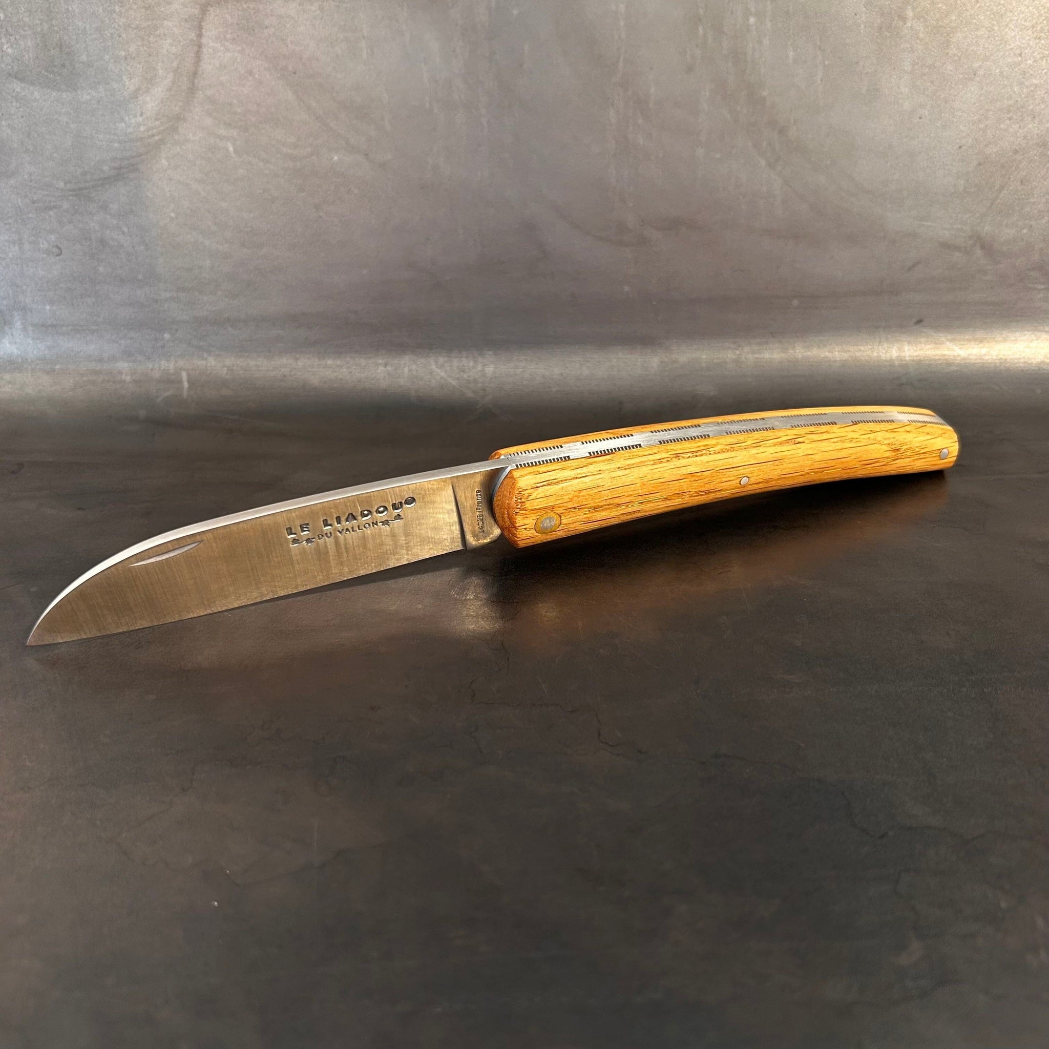 Liadou Exception in cask oak & Chiseled Plates