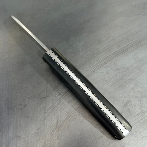 Liadou Exception in Ebony with Chiseled Plates
