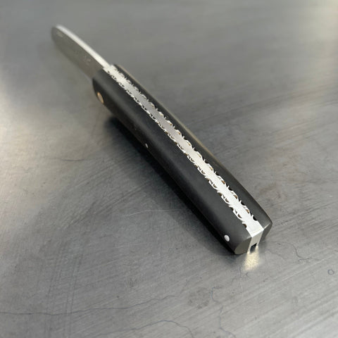 Liadou Exception in Ebony with Chiseled Plates