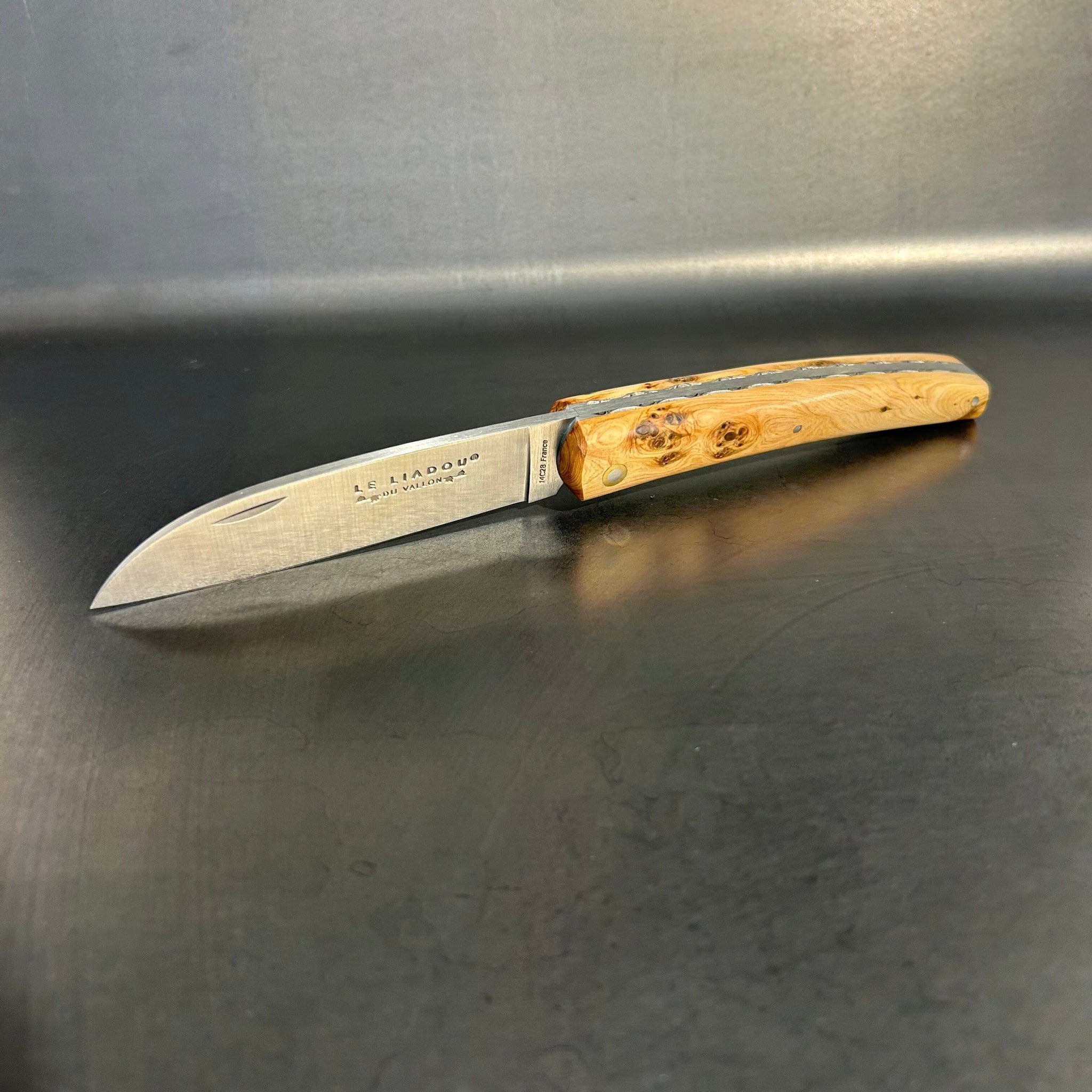 Liadou ® Exception in Juniper & Chiseled Plates