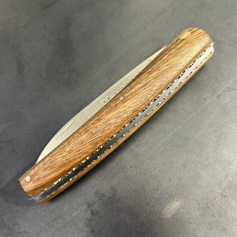 Liadou Exception in Vallon Walnut & Chiseled Plates