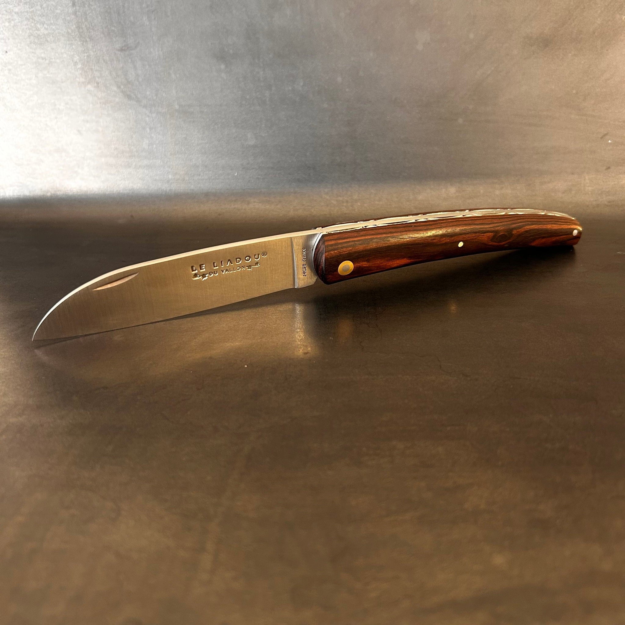 Liadou Exception in Kingwood with engraved liners 